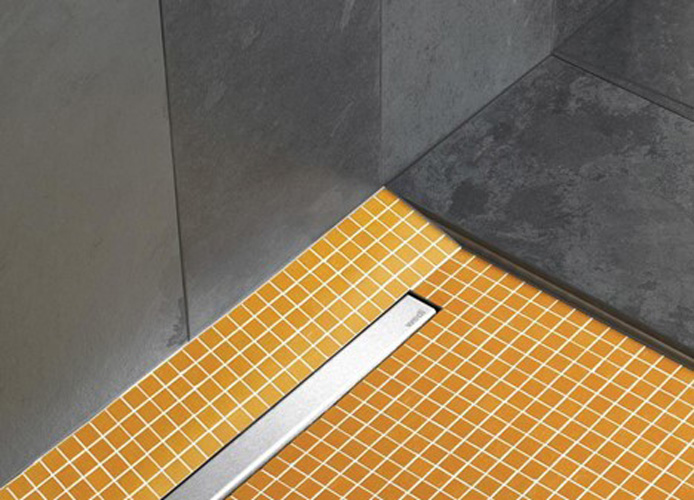 glass block shower wall in blue and white